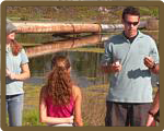 A trained volunteer teaching a mini lesson